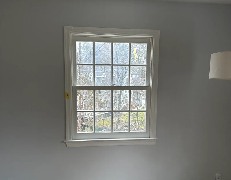 These double hung windows make the bedroom cold